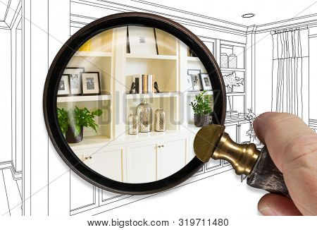 Hand Holding Magnifying Glass Revealing Finished Built-In Over Drawing.