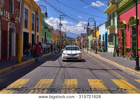 San Pedro Cholula, Mexico, September 30, 2019 - Avenida Morelos Street Of Cholula With Tourists And 