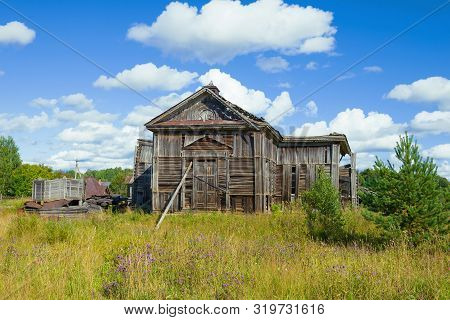 Ruins Of The Ancient Wooden Church Of The Tikhvin Icon Of The Mother Of God On A Sunny August Day. S