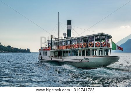 Lake Garda, Italy - July 26, 2019: An Old Paddle Steamer Boat On Lake Garda