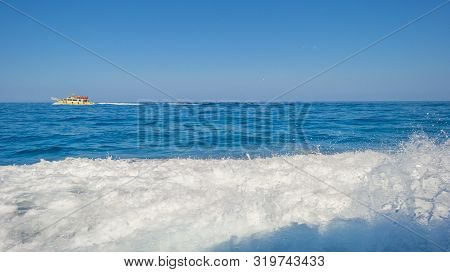 Rocky Coast Of The Island Of Sardinia In The Mediterranean Sea Viewed From A Boat