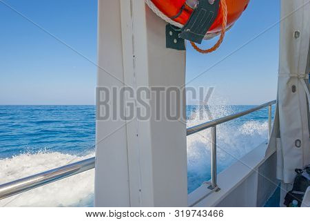 Rocky Coast Of The Island Of Sardinia In The Mediterranean Sea Viewed From A Boat