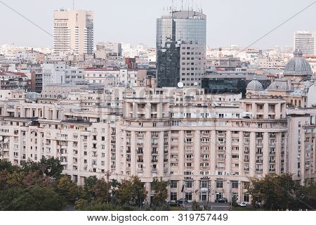 Cityscape Of Old Part Of Bucharest, With Many Worn Out Buildings, As Seen From The Palace Of Parliam