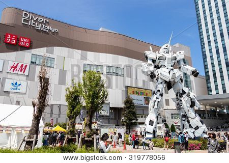 Tokyo, Japan - April 28, 2019, The Unidentified Traveler Look At Rx-0 Unicorn Gundam Statue In Norma