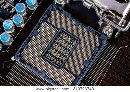 Opened Central Processor Lga Slot On Pc Mainboard - Closeup Shot With Selective Focus And Blur