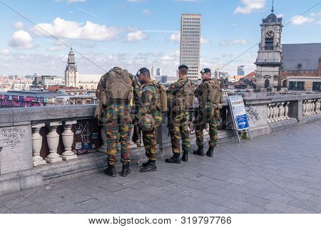 Brussels, Belgium - June 6, 2019: Belgian Soldiers At Place Poelaert Brussels Near Memorial For The 