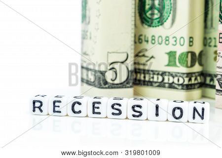 Recession Concept, American Dollar Banknote Blocks In All Denominations In One Row On White Backgrou
