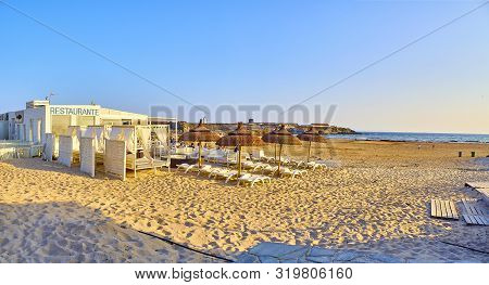 Tarifa, Spain - June 27, 2019. People Enjoying A Sunbathing In The Playa De Los Lances Beach. View F
