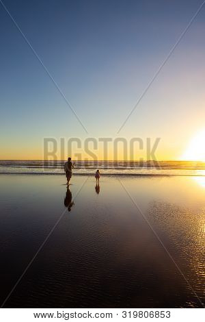 Sunset At Piha Beach, North Island, New Zealand