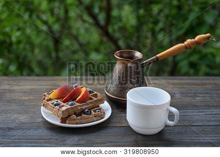 Chocolate Belgian Waffles With Fruits, Cup Of Coffee And Ceezve On Green Background. Delicious Break