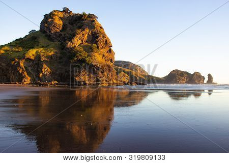 Beautiful Sunset At Piha Beach, New Zealand