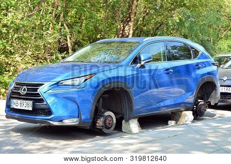 Warsaw, Poland. 31 August 2019. Car Lexus Nx200t Without Wheels On The Street.