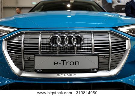Cracow, Poland - May 18, 2019: Audi E-tron Metalic Logo Closeup On The Car Displayed At Moto Show In