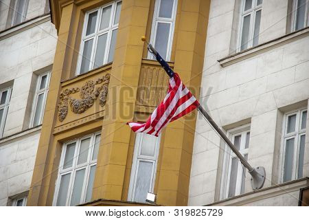 Wrapped Around Flagpole Flag Of The Usa In Russia Moscow