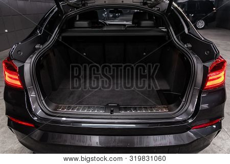 Novosibirsk, Russia - August 19, 2019:  Bmw X4 ,close-up Of The Open Trunk, Headlight, Bumper,  Fron