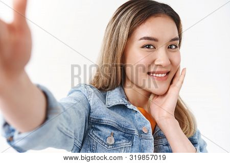 Close-up Flirty Lovely Tender Asian Blond Girl Extend Arm Hold Smartphone Taking Selfie Look Sweet S
