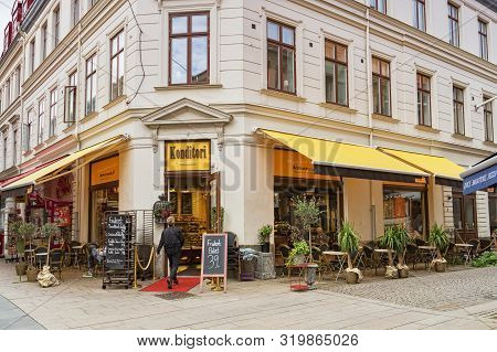 14 September 2018: Gothenburg, Sweden - Woman Entering Konditori Restuarant Or Coffee Shop.
