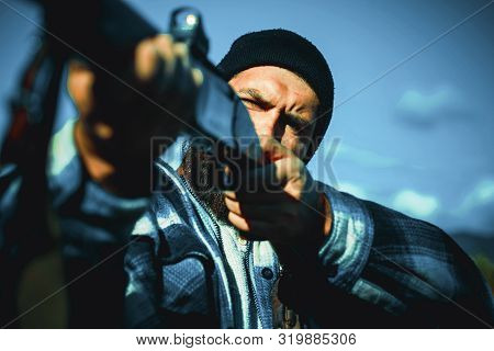 Hunter Man. A Hunter With A Hunting Gun And Hunting Form To Hunt In Forest. Hunting In America. Hunt