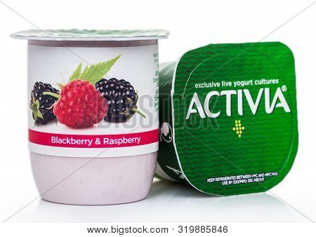 London, Uk - August 18, 2019: Cup Of Activia Exclusive Live Yogurt Cultures With Summer Berries On W