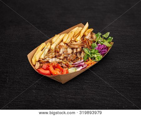 Turkish Plate Kebab On Black Background, Studio Shot