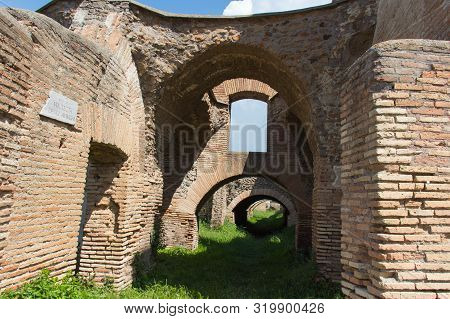 Italy, Ostia - April 16 2017: The View Of Arches At Via Tecta Degli Aurighi In The Ancient Roman Por