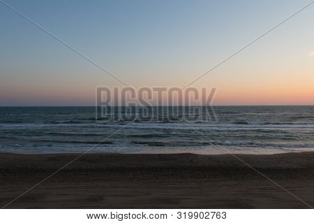 The View Of Twilight On Tyrrhenian Sea Beach.