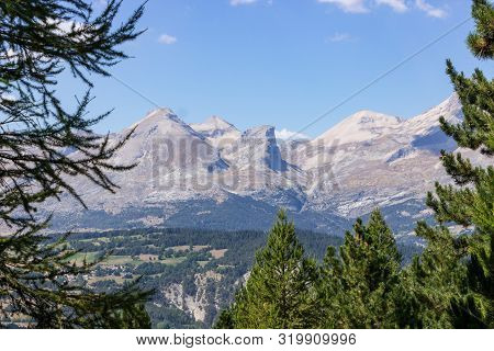 Scenic View Of The Devoluy Mountains On A Warm Summer's Day