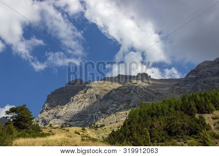 Scenic View Of The Devoluy Mountains On A Warm Summer's Day