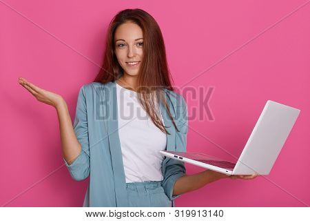 Close Up Portrait Of Young Caucasian Girl Teen Student Wearing Elegant Clothes, Holding Portable Not