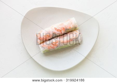 Top View Of Nem Cuon (fresh Vietnamese Nem Roll With Shrimps, Mango And Ginger) On White Plate On Wh