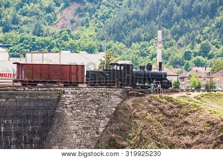 Jablanica, Bosnia And Herzegovina - July 18, 2019. Historic Train In The End Of Destroyed Bridge