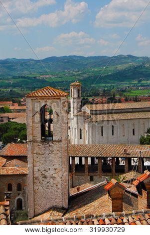 View Of Gubbio Old Medieval Historic Center With The Beautiful Umbrian Contryside In The Background