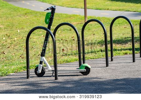 Washington, Dc - August 8, 2019: Lime Brand Dockless Scooter Parked Properly In A Bike Rack
