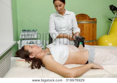 Cryolipolysis Fat Freezing Treatment. Weight Loss And Slimming Procedure In Beauty Salon