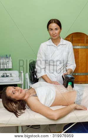 Cryolipolysis Fat Freezing Treatment. Weight Loss And Slimming Procedure In Beauty Salon