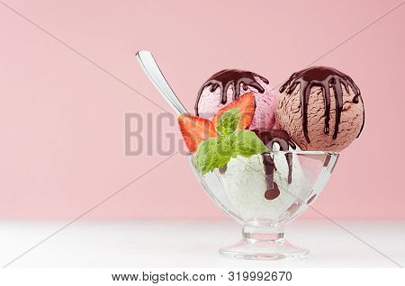 Summer Cold Dessert - Three Creamy Ice Cream Balls Different Color In Bowl With Chocolate, Strawberr
