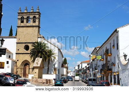 Ronda, Spain - May 13, 2008 - View Of Our Father Jesus Church And Shopping Street In The Old Town, R