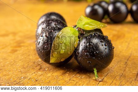 Jabuticaba, Jabuticabas In Detail On Rustic Wood, Selective Focus.