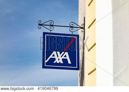 Karvina Czech Republic - September 13, 2020: Blue Banner Of Axa Insurance Company On An Old Building