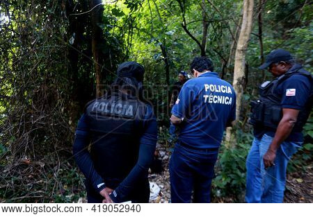 Salvador, Bahia, Brazil - August 24, 2015: Agents From The Homicide Police Station And Experts Carry