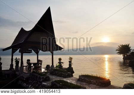 Pavilion Traditional Batak House Indonesia Style At Ambarita Of Resort Hotel Sunset Dusk Time At Dan