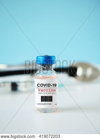Close-up Of A Simulated Covid-19 Vaccine In A Vial For Protective Coronavirus On White Background Wi
