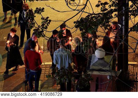 Thessaloniki, Greece - May 01 2021: Orthodox Easter 2021 Anastasi Resurrection. Faithful Wearing Fac