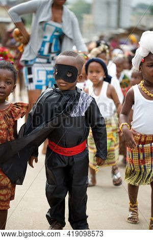 Abidjan, Ivory Coast - February 13, 2018: Little Boy Dressed In Zoro Held By Children Also Dressed I