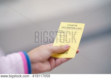 Passport With Vaccination Certificate For Covid-19 Person Record Card. Immune Passport Or Certificat