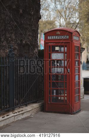 Westminster, London | Uk -  2021.05.02: An Old Vintage Red Phone Booth On The Millbank