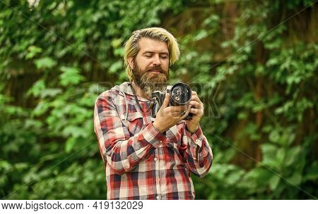 Use Camera. Creating Content For Blog. Bearded Man Hipster Taking Photo. Photographer And Vintage Ca