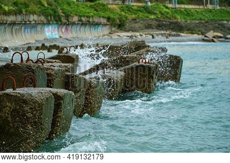 Breakwater On Beach. Ocean Beach Breakwaters. Old Concrete Blocks Campi.