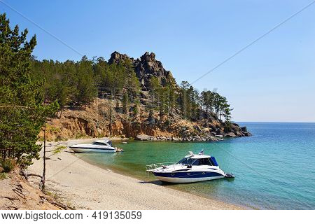 The Beautiful Sandy Beach On Summer Sunny Day. Yachts Near The Shore. Lake Baikal, The Sandy Bay.