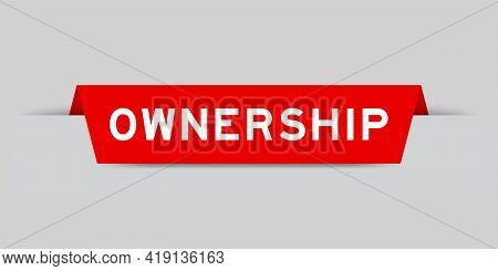 Red Color Inserted Label With Word Ownership On Gray Background